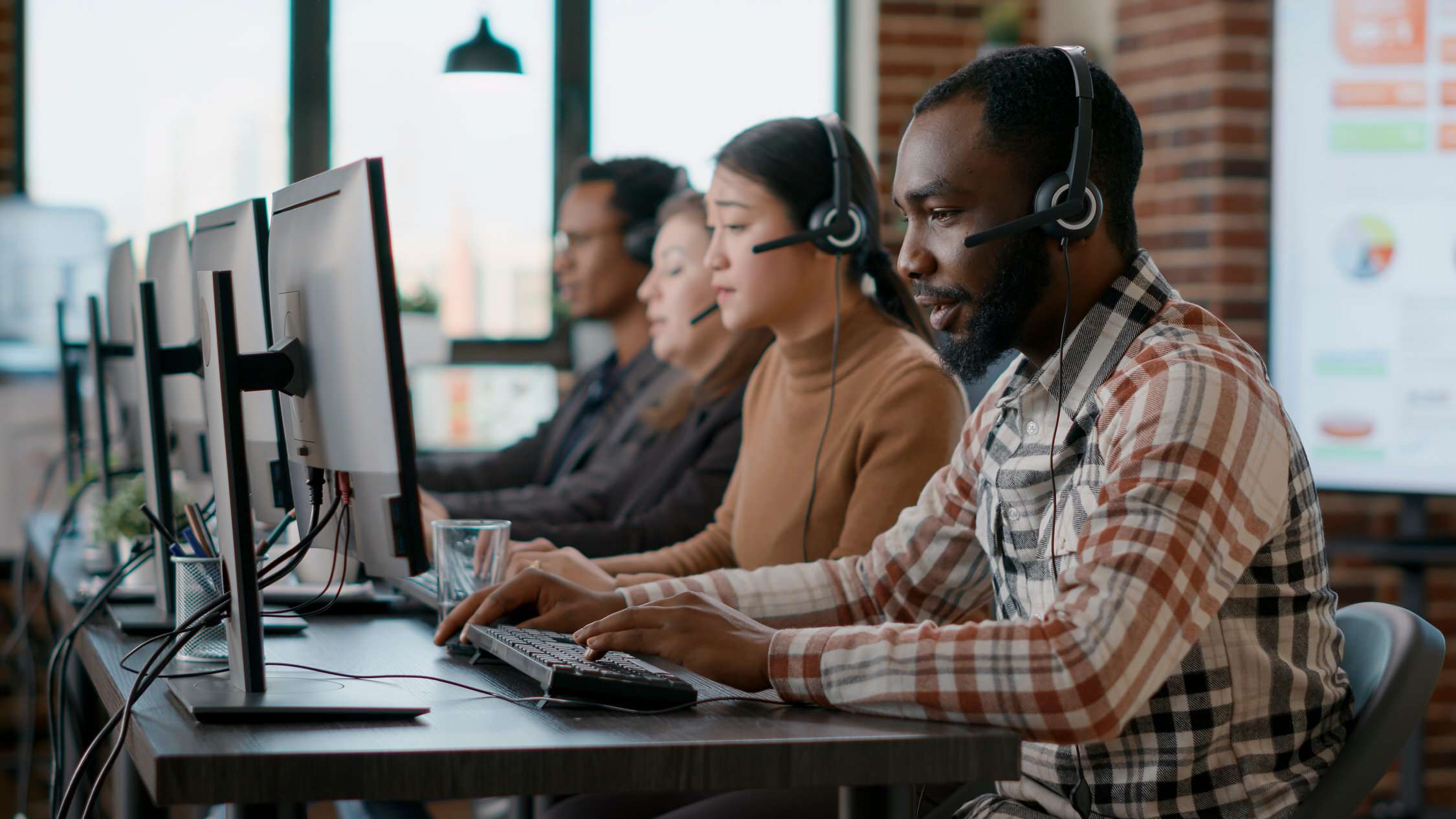 African american man working at call center office